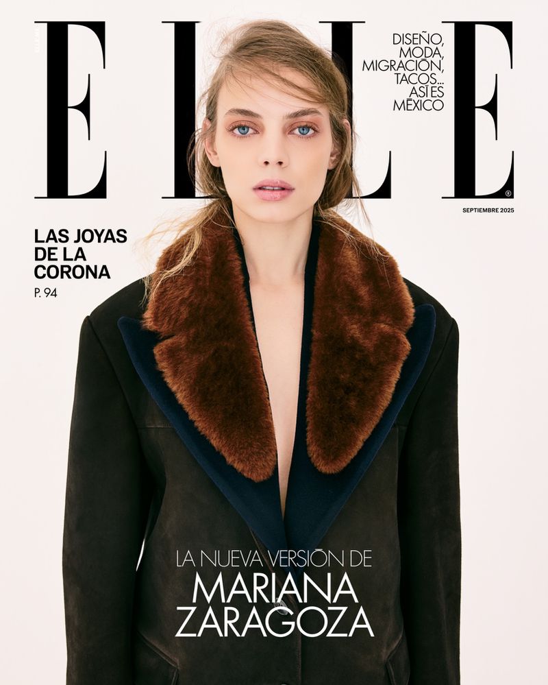 Elle magazine cover featuring a woman with blond hair wearing a black coat with a brown fur collar on a neutral background.
