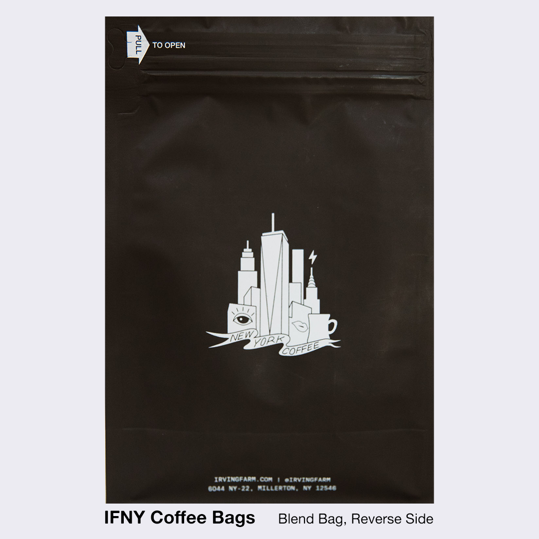 Black coffee bag features a white New York City skyline graphic, including the World Trade Center, coffee cup, and eye illustration.