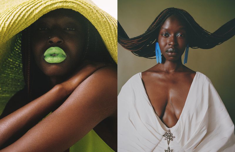 Portrait of two dark-skinned adult females. One wears a large straw hat and bright green lipstick, the other with braids and long earrings.