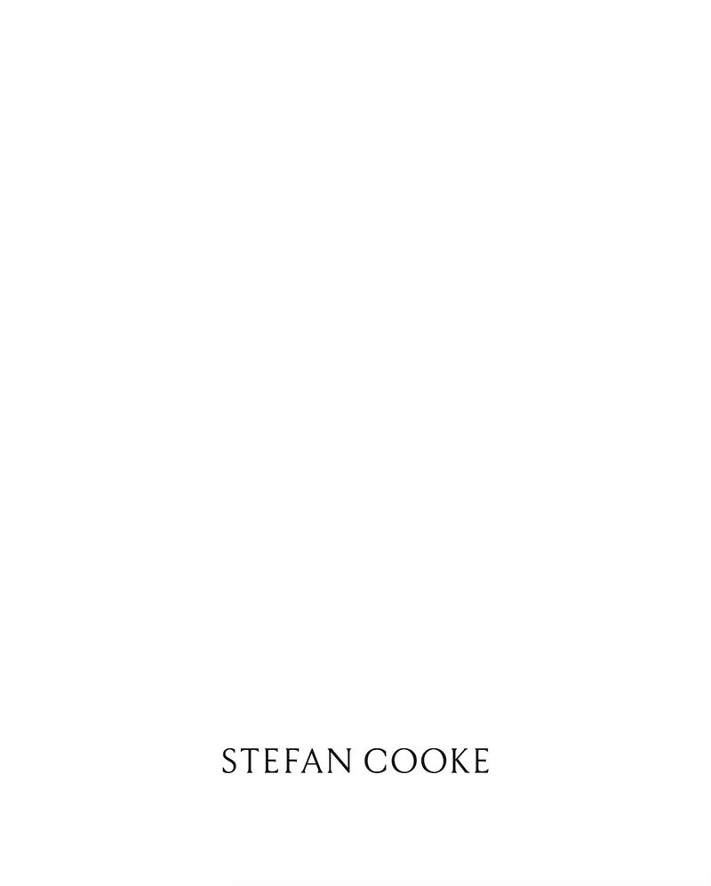 A minimalist white background with the text 'STEFAN COOKE' centered at the bottom, for fashion or design purposes.