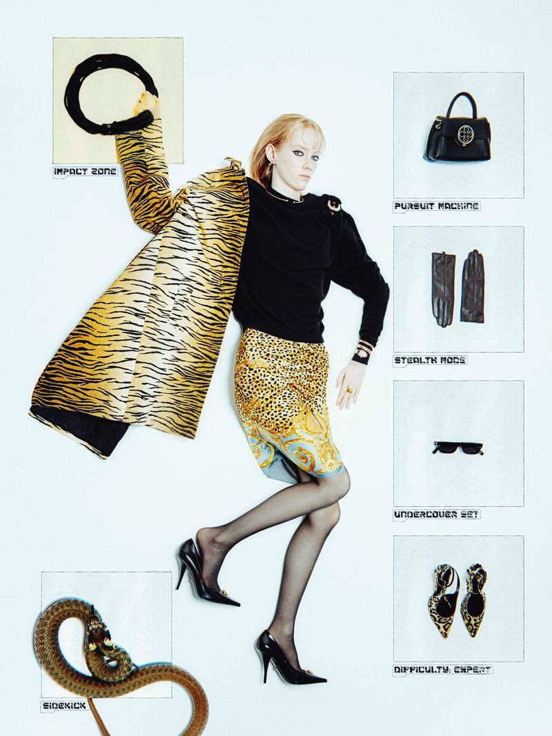 Fashion editorial featuring a woman in a black top and animal-print skirt, surrounded by luxury accessories and text on a white background.