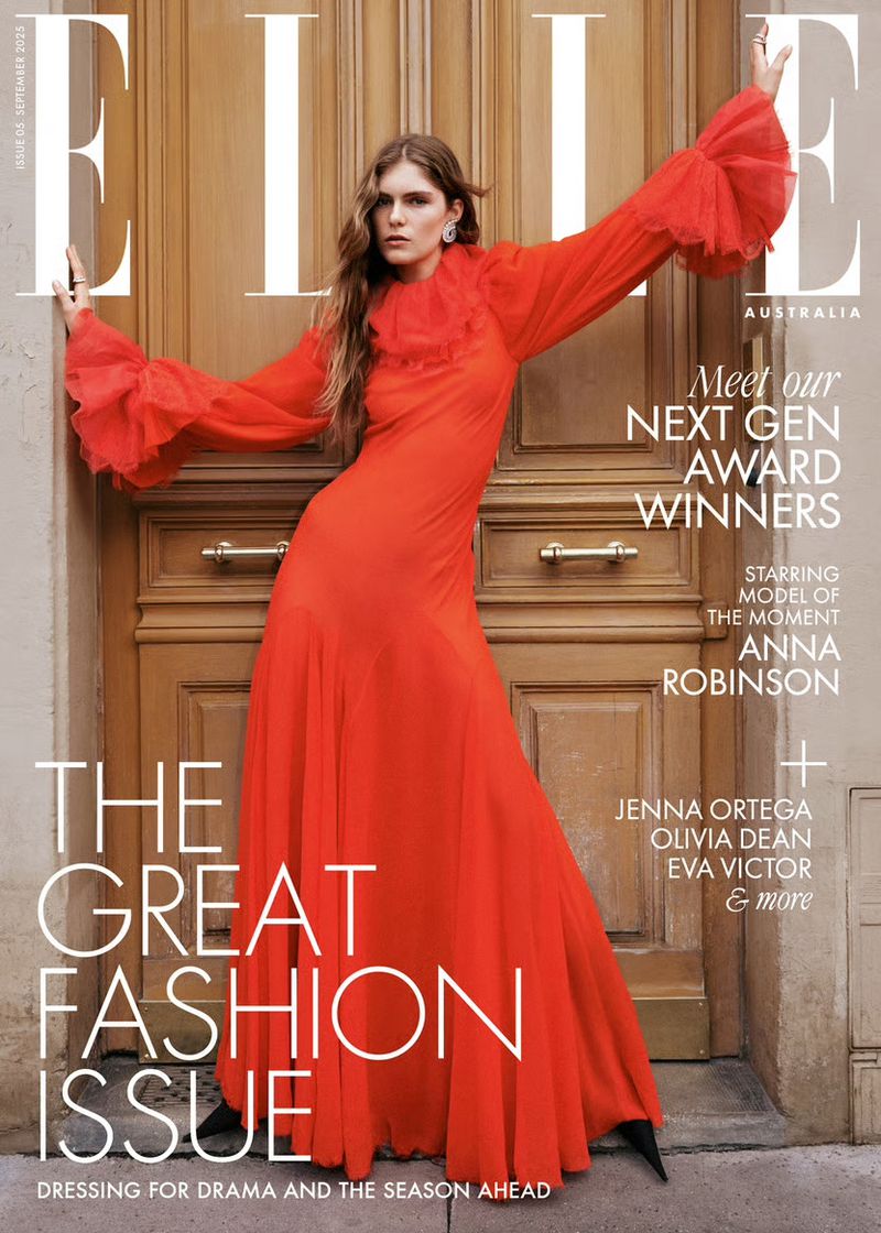 Elle Australia magazine cover featuring a female model in a red dress posing in front of a paneled door. Fashion editorial, style.