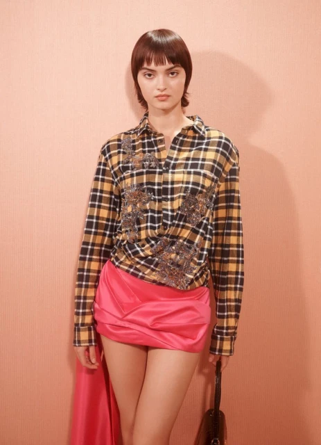 HUE'S THAT GIRL? BY BRETT CLARKE