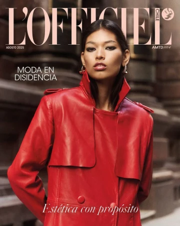 Magazine cover featuring a woman in a red leather coat against a blurred urban backdrop, promoting 'L'Officiel Chile' and fashion.