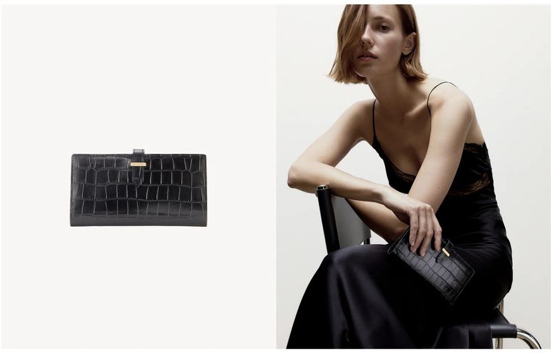 Woman seated, holds textured black clutch. Isolated black clutch to the left. Fashion and style, solid white background.