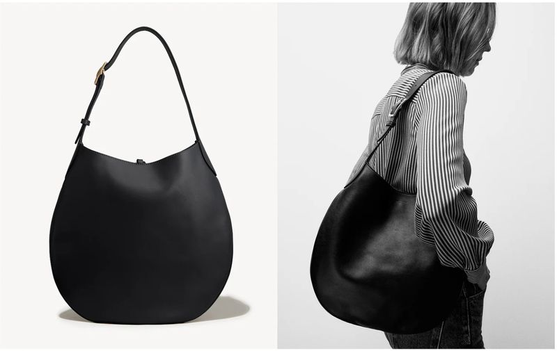 Black leather hobo bag isolated against a white backdrop and on a person with a striped shirt in a studio setting.