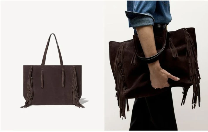 A dark brown suede fringe tote bag shown as a standalone product shot and held by a model wearing a denim shirt in a studio setting.