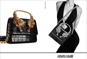 Roberto Cavalli Roar handbag with tiger hardware and model in a black dress