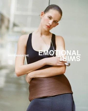 Model Ansolet Rossouw in a black tank top and pleated brown waistband for WRPD Magazine.