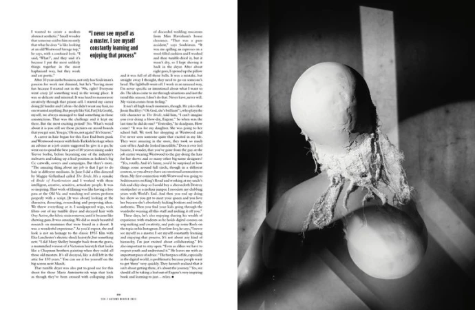Black and white studio shot of a draped sculpture, evoking texture and form through stark lighting and shadow play.