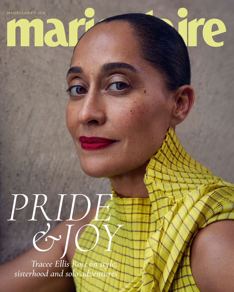 Close-up of Tracee Ellis Ross on the cover of Marie Claire magazine, wearing a yellow dress. The background is a neutral grey.