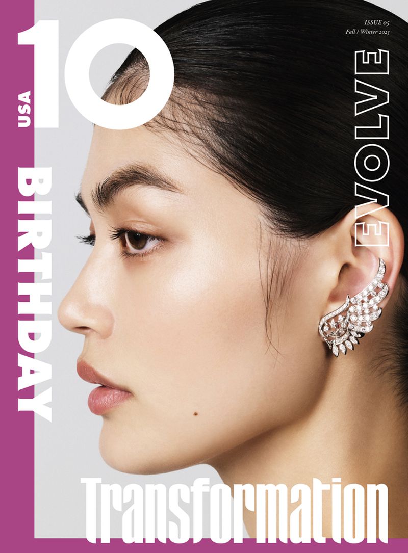 Magazine cover featuring a woman in profile wearing ornate ear cuff jewelry, with overlaid text for a 10th-anniversary issue.