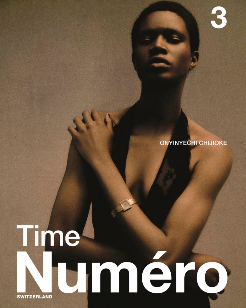 Magazine cover featuring a Black woman with a watch posing, against a neutral background, and with the words Time Numéro on the cover.