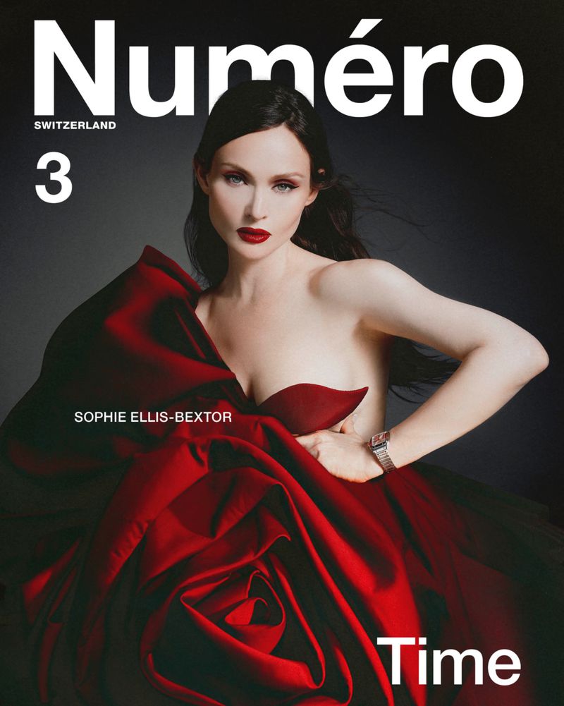 Magazine cover featuring a woman with red lips and a red dress against a gray background with visible text, "Numero Switzerland".