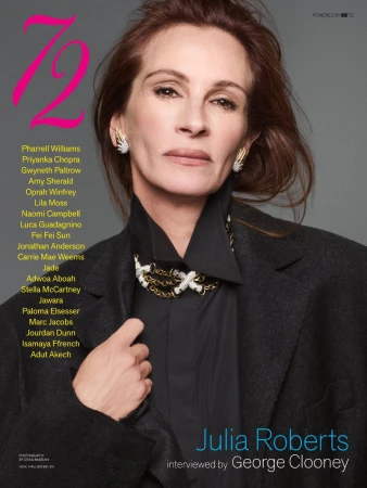 Julia Roberts on magazine cover. Portrait of adult woman with auburn hair wearing a black coat and jeweled necklace, interviewed by George Clooney.
