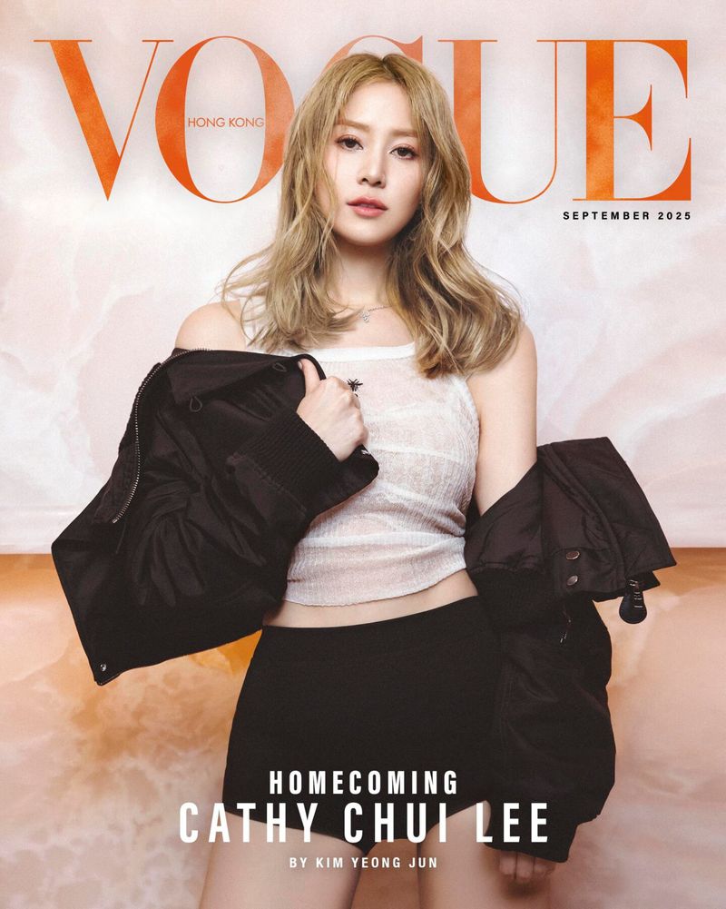 Vogue Hong Kong cover featuring Cathy Chui Lee, September 2025 issue. Lee wears a white top, black jacket, and shorts against a mottled background.
