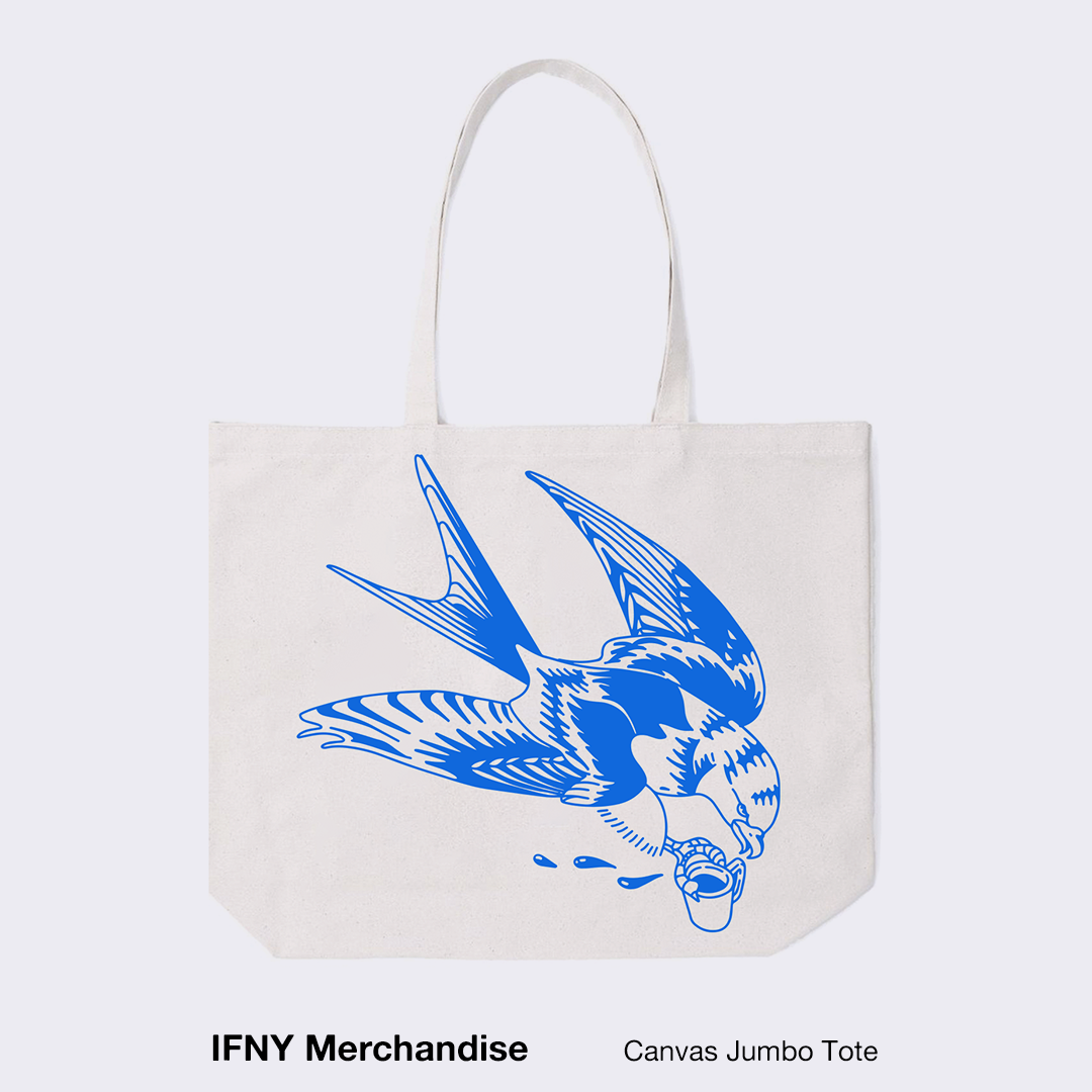 A tote bag is adorned with a bold blue bird illustration, showcasing a unique design and practical style against a white background.