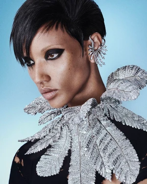 Model Georgia Palmer wearing a sparkling crystal collar and ear cuff for the Swarovski Vienna Collection campaign.