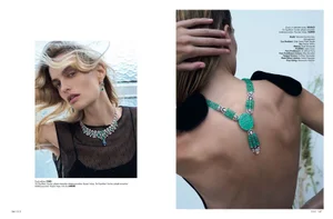 Double-page spread editorial featuring model Veronika Vilim wearing diamond and emerald fine jewellery for Elle Turkiye.