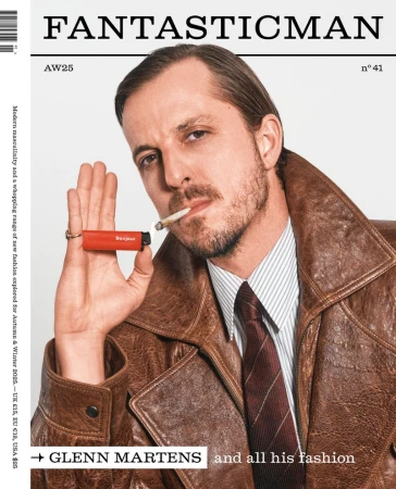 Magazine cover featuring a man smoking, wearing a leather jacket and tie, holding a lighter. The magazine is titled 'Fantastic Man'.