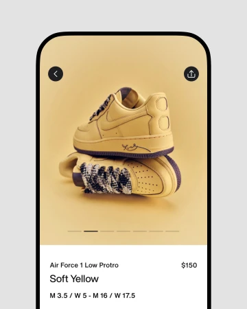 Two tan-colored Nike Air Force 1 Low Protro sneakers are stacked on top of each other, displayed on a phone screen with a beige background.