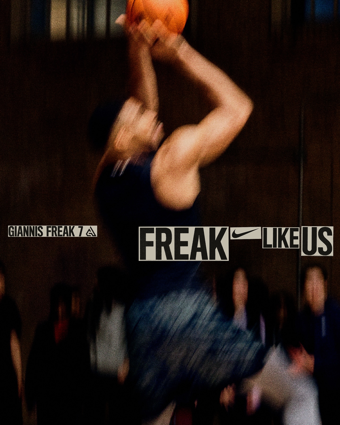 Athlete in motion jumps to shoot a basketball against blurred figures and a dark background, with prominent 'FREAK LIKE US' text overlay.