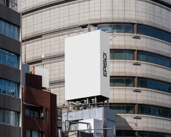 A modern billboard advertisement for EPISCI stands out against a backdrop of urban buildings, creating a stark contrast between commerce and architecture.