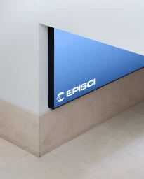 Illuminated blue angular signage displaying the white EpiSci logo mounted on a clean white interior corner above stone flooring.