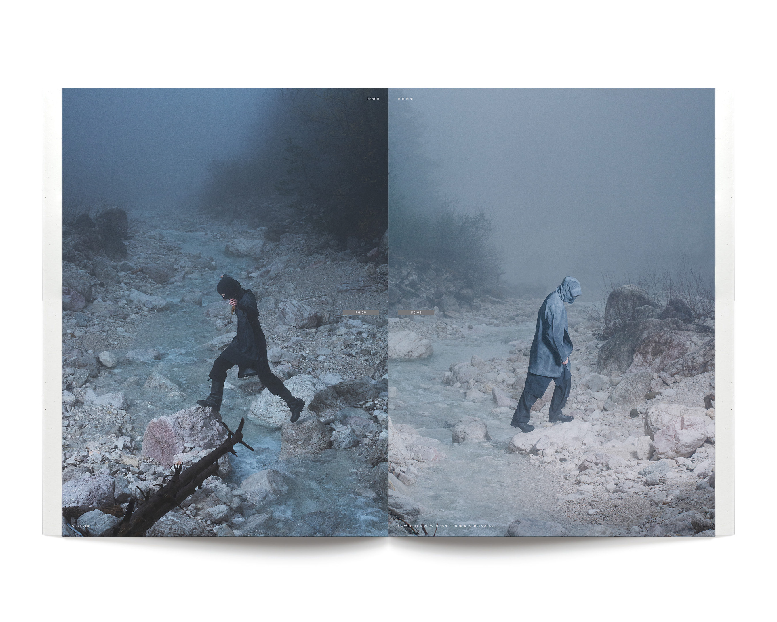 Two images in an open magazine show a person in a hooded cloak walking across rocks in a foggy, rocky landscape with a stream.