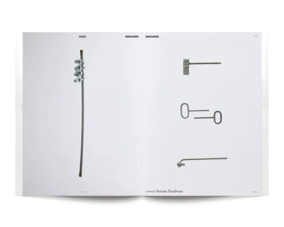 Open catalog spread features two pages of silver-toned metal hardware parts and components displayed against a bright white background.
