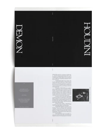 Open magazine spread with black and white pages. 'Demon' and 'Houdini' text featured, with columns of smaller body text.