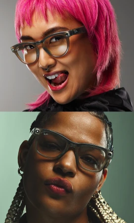 Close-up portrait of two women wearing Ray-Ban eyeglasses; one with pink hair is sticking out her tongue, the other has braids.