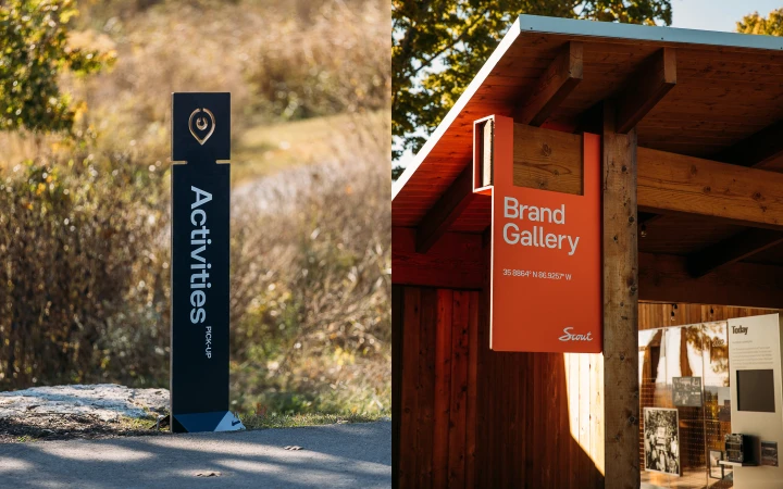 A black informational sign with white text 'Activities PICK-UP' stands next to a sign for the 'Brand Gallery' hanging under a wooden awning.