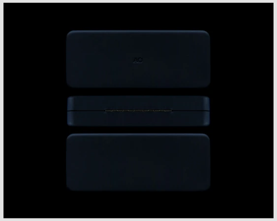 Three dark blue cases stacked vertically against a black background. The middle case is positioned to show a hinge detail.
