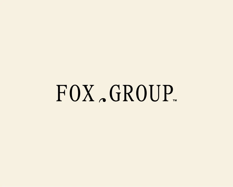 Fox Group logo in simple black text on a cream background. The logo is centered and easy to read. Minimalist design.