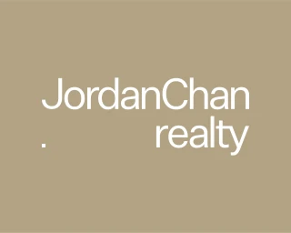 White sans-serif typography reading JordanChan realty set against a solid warm taupe background.