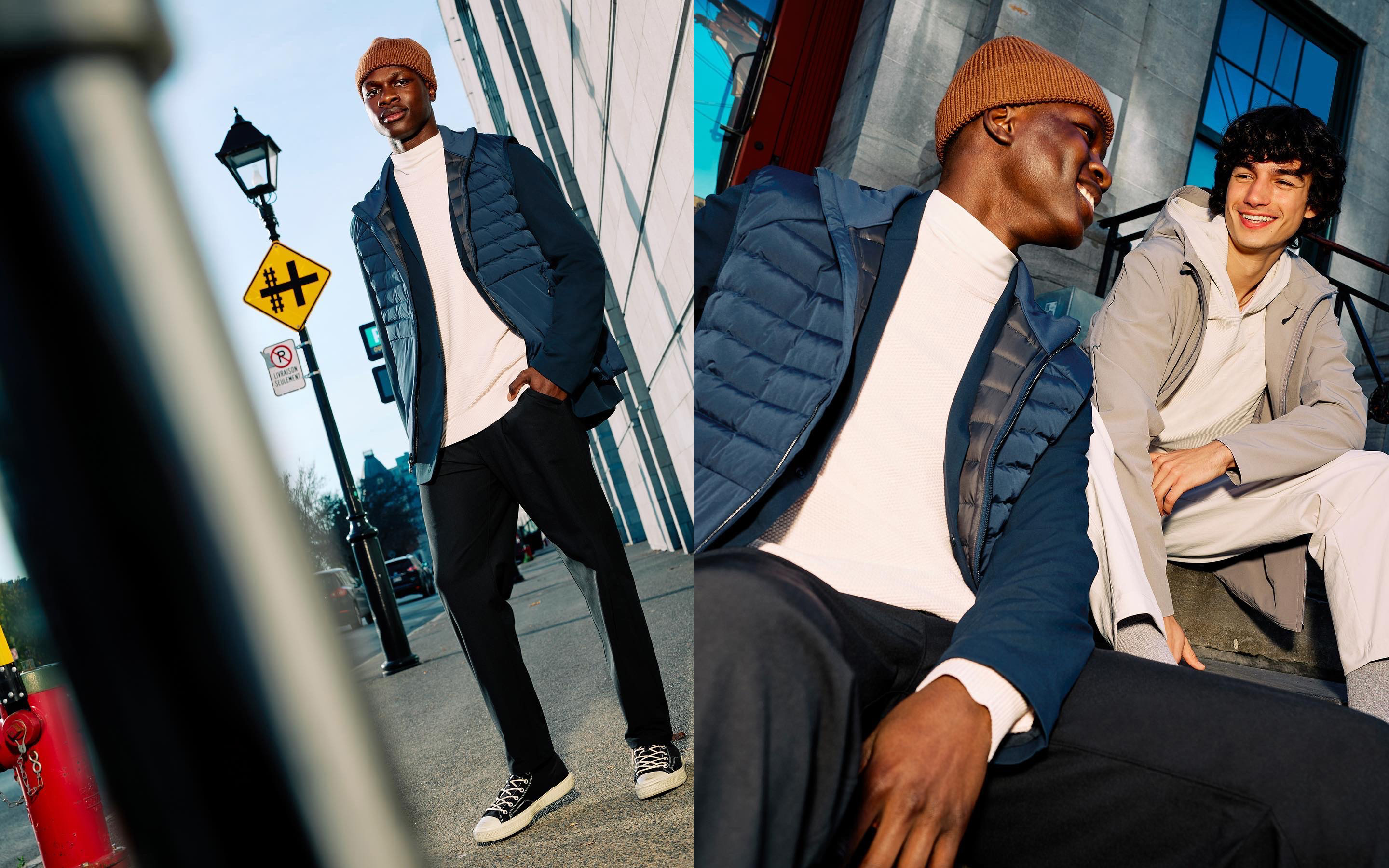 Two men in stylish outerwear stand and sit outdoors in an urban setting. One man models a blue quilted jacket and the other wears grey.