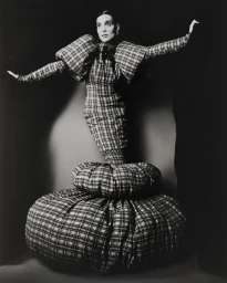Charlee Fraser in a sculptural plaid dress and large puff skirt for Alice.D Magazine, photographed by Levon Baird.