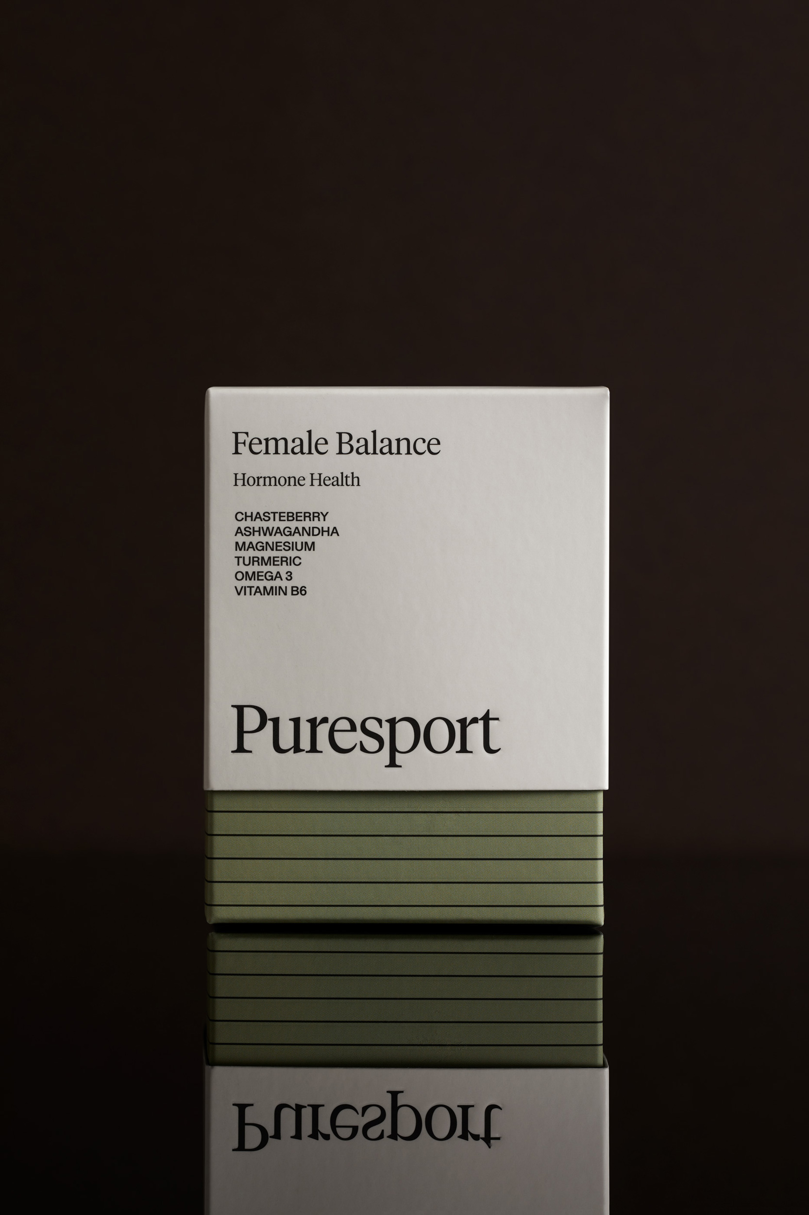Puresport female balance supplement box in white and green, promoting hormone health with chasteberry, ashwagandha, magnesium, turmeric, omega 3, and vitamin B6.