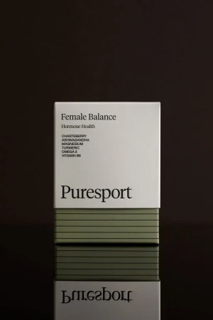 Puresport female balance supplement box in white and green, promoting hormone health with chasteberry, ashwagandha, magnesium, turmeric, omega 3, and vitamin B6.