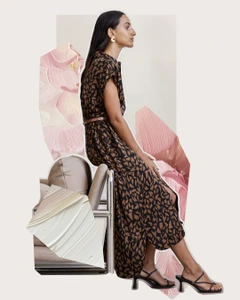 Woman in printed midi dress sitting on a modern sofa against a collaged background with pink brushstroke graphics