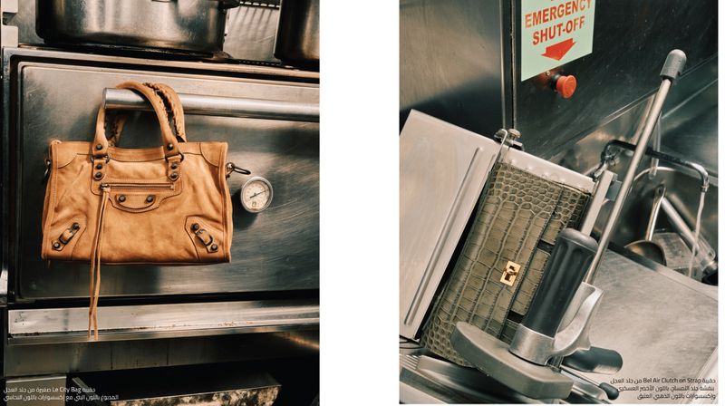 Two handbags are presented in a side-by-side product shot, one beige leather and the other crocodile skin, inside a commercial kitchen.