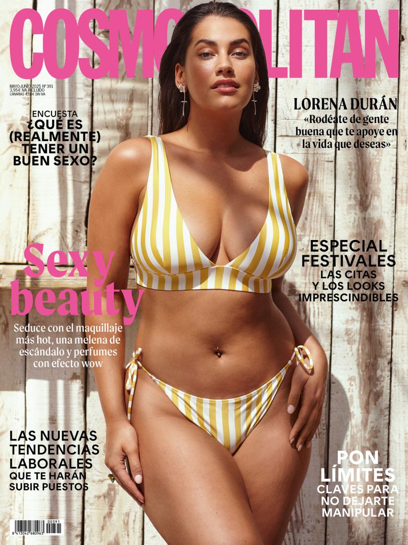 Cosmopolitan magazine cover featuring a woman in a striped bikini against a weathered wooden background. The cover features headlines.
