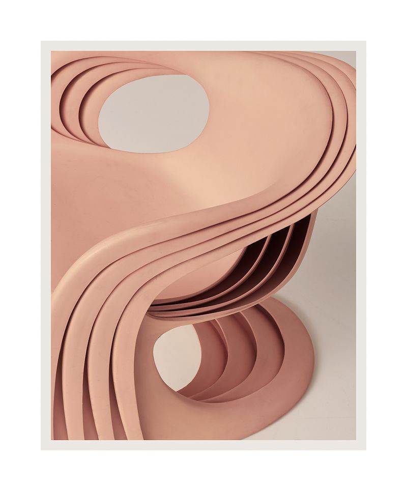 Abstract art piece features curved salmon-colored layers with round openings, set against a neutral beige background, creating a modern design.
