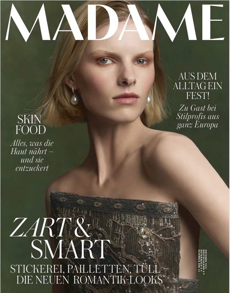 Magazine cover featuring a blonde female model in a beaded top, looking at the camera against an olive green backdrop, ‘Madame’ magazine.