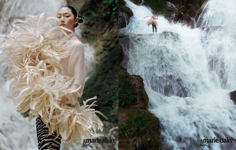 Two images show a woman in a feather shawl in front of a waterfall and a woman standing on a waterfall wearing a dress.