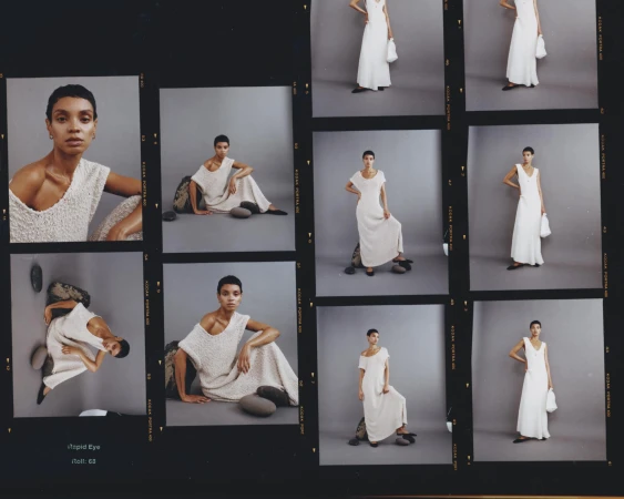 Contact sheet of medium-format film frames featuring a model with short hair in textured off-white dresses against a grey studio backdrop.