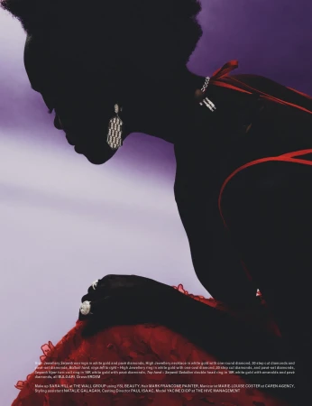 Fashion shot features a dark-skinned woman in a red dress and jewelry, silhouetted against a purple background. Close-up on model's face and hands.