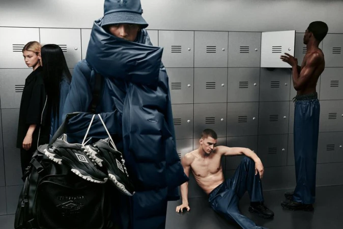 Several people pose in a locker room setting, wearing athletic apparel and carrying a duffel bag with shoes, showcasing an athleisure fashion style.