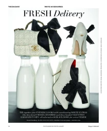 White Chanel tweed handbag and Valentino high heel pumps styled with black bows resting atop glass milk bottles for Harper's Bazaar.